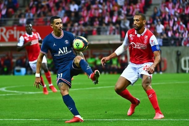 Angel DI MARIA of PSG and Yunis ABDELHAMID of Reims during the Ligue 1 Uber Eats match between Reims and Paris Saint Germain at Stade Auguste Delaune...
