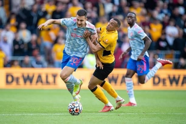 Diogo Dolot of Manchester United and Marcal of Wolverhampton Wanderers in action during the Premier League match between Wolverhampton Wanderers and...