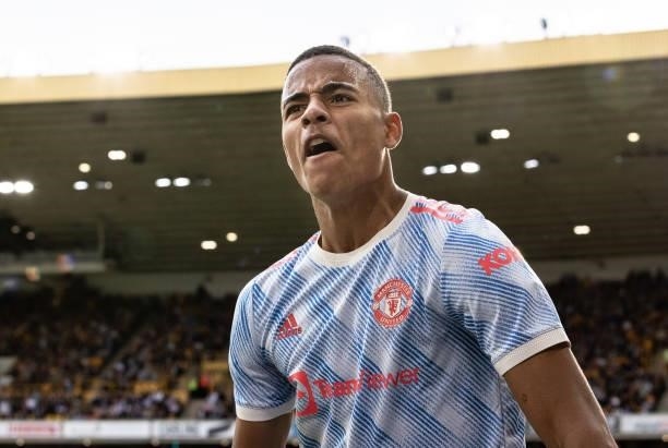 Manchester United's Mason Greenwood celebrates scoring his side's first goal during the Premier League match between Wolverhampton Wanderers and...
