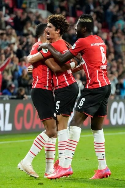 Andre Ramalho of PSV celebrates 3-2 with Cody Gakpo of PSV, Ibrahim Sangare of PSV during the Dutch Eredivisie match between PSV v FC Groningen at...