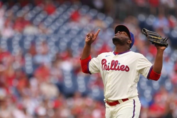 Hector Neris of the Philadelphia Phillies gestures after getting the final out of the seventh inning against the Arizona Diamondbacks during their...