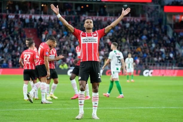 Cody Gakpo of PSV celebrates 1-0 during the Dutch Eredivisie match between PSV v FC Groningen at the Philips Stadium on August 28, 2021 in Eindhoven...