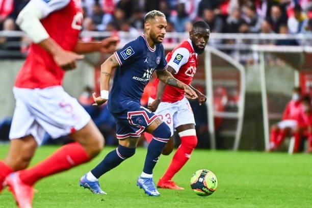 Of PSG and Moreto CASSAMA of Reims during the Ligue 1 Uber Eats match between Reims and Paris Saint Germain at Stade Auguste Delaune on August 29,...