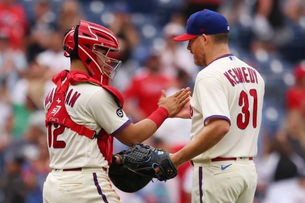 Catcher Rafael Marchan and closer Ian Kennedy of the Philadelphia Phillies congratulate each other after defeating the Arizona Diamondbacks 7-4 in a...