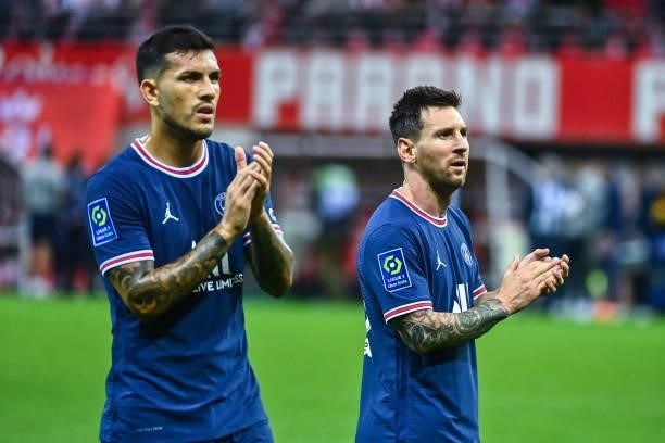 Leandro PAREDES of PSG and Lionel MESSI of PSG celebrate during the Ligue 1 Uber Eats match between Reims and Paris Saint Germain at Stade Auguste...