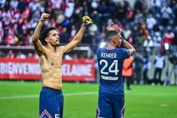 Of PSG celebrates with Thilo KEHRER of PSG during the Ligue 1 Uber Eats match between Reims and Paris Saint Germain at Stade Auguste Delaune on...