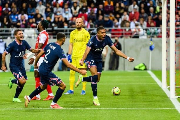 Kylian Mbappe of Paris Saint Germain celebrating his goal with his teammates during the Ligue 1 Uber Eats match between Reims and Paris Saint Germain...