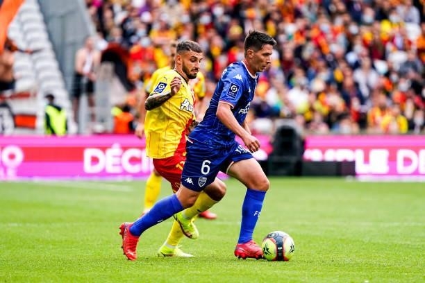 Jonathan CLAUSS of RC Lens and Laurent ABERGEL of FC Lorient during the Ligue 1 Uber Eats match between Lens and Lorient at Stade Bollaert-Delelis on...