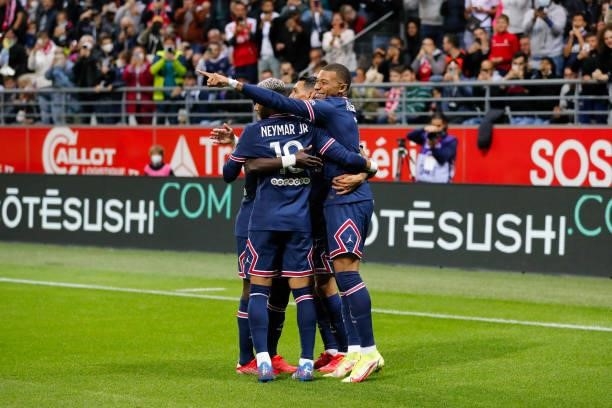 Kylian Mbappe of Paris Saint-Germain celebrates his goal with Angel Di Maria and Neymar Jr of Paris Saint-Germain during the Ligue 1 Uber Eats match...