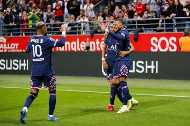 Kylian Mbappe of Paris Saint-Germain celebrates his goal with Angel Di Maria and Neymar Jr of Paris Saint-Germain during the Ligue 1 Uber Eats match...