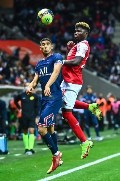 Achraf HAKIMI of PSG and El Bilal TOURE of Reims during the Ligue 1 Uber Eats match between Reims and Paris Saint Germain at Stade Auguste Delaune on...