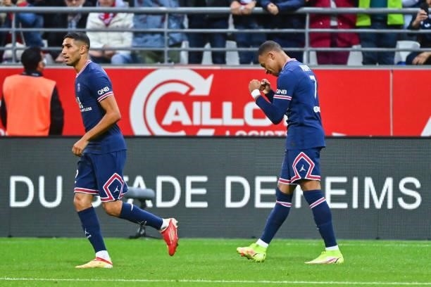 Kylian MBAPPE of PSG celebrates a goal with Achraf HAKIMI of PSG during the Ligue 1 Uber Eats match between Reims and Paris Saint Germain at Stade...