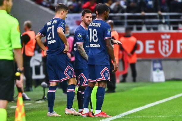Lionel MESSI of PSG, Ander HERRERA of PSG and Georginio WIJNALDUM of PSG during the Ligue 1 Uber Eats match between Reims and Paris Saint Germain at...