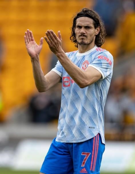 Manchester United's Edinson Cavani applauds his sides travelling supporters during the Premier League match between Wolverhampton Wanderers and...