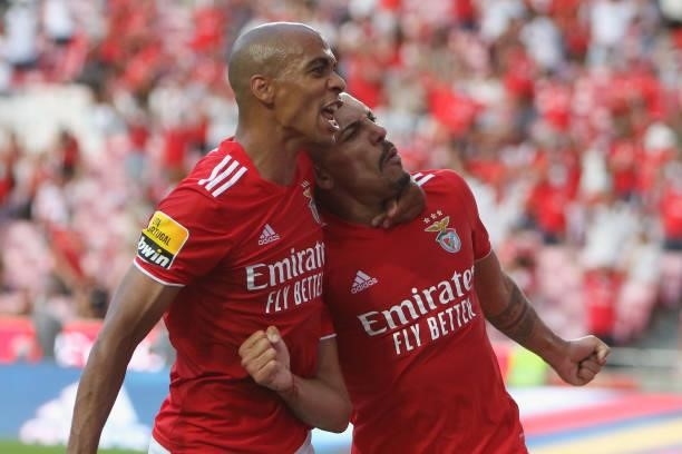 Gilberto defender of SL Benfica celebrates with Joao Mario after scoring a goal during during the Liga Portugal Bwin match between SL Benfica and CD...
