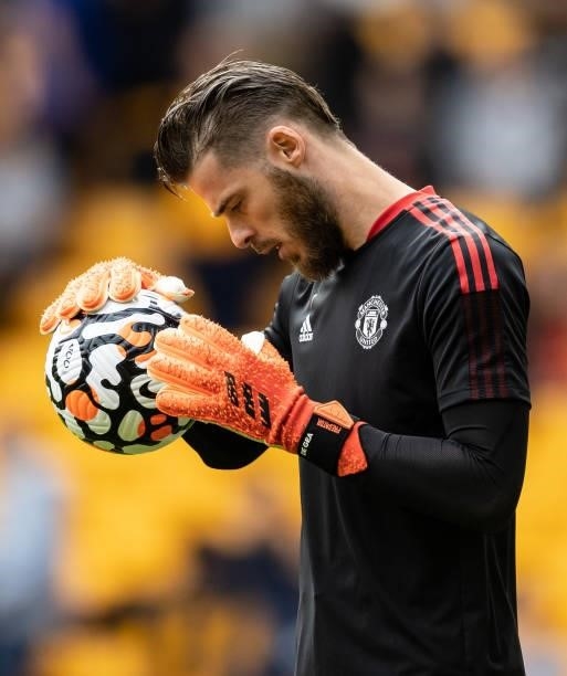 Manchester United's David De Gea warming up before the match during the Premier League match between Wolverhampton Wanderers and Manchester United at...