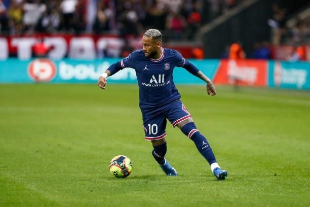 Neymar Jr of Paris Saint-Germain controls the ball during the Ligue 1 Uber Eats match between Reims and Paris Saint Germain at Stade Auguste Delaune...