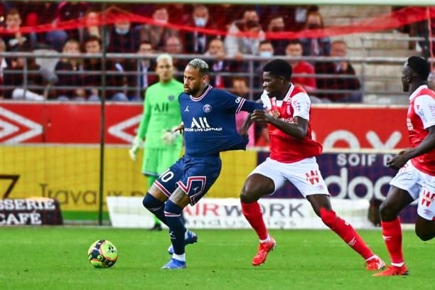 Of PSG and Marshall MUNETSI of Reims during the Ligue 1 Uber Eats match between Reims and Paris Saint Germain at Stade Auguste Delaune on August 29,...