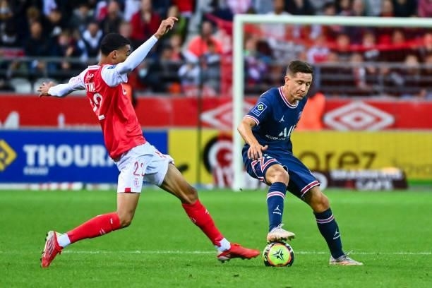 Ander HERRERA of PSG and Hugo EKITIKE of Reims during the Ligue 1 Uber Eats match between Reims and Paris Saint Germain at Stade Auguste Delaune on...