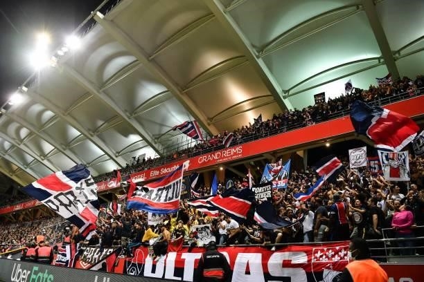 Fans of PSG during the Ligue 1 Uber Eats match between Reims and Paris Saint Germain at Stade Auguste Delaune on August 29, 2021 in Reims, France.