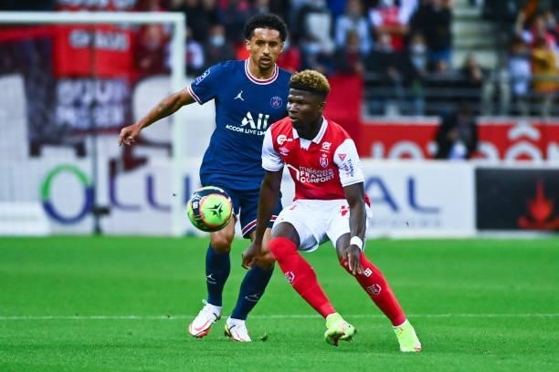 El Bilal TOURE of Reims and MARQUINHOS of PSG during the Ligue 1 Uber Eats match between Reims and Paris Saint Germain at Stade Auguste Delaune on...