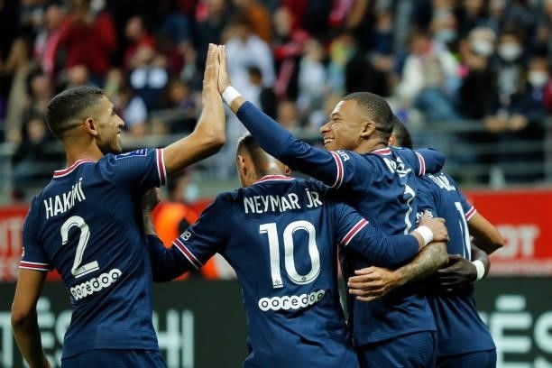 Kylian Mbappe of Paris Saint-Germain celebrates his goal with Angel Di Maria, Neymar Jr and Achraf Hakimi of Paris Saint-Germain during the Ligue 1...