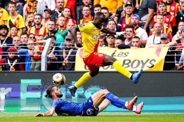Leo PETROT of FC Lorient and Ignatius GANAGO of RC Lens during the Ligue 1 Uber Eats match between Lens and Lorient at Stade Bollaert-Delelis on...