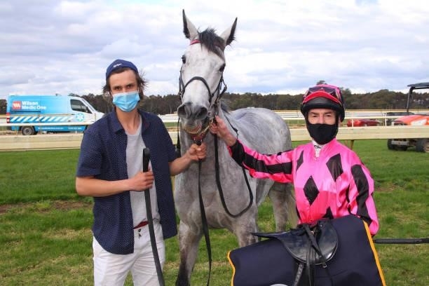 Grandma Gail with Craig Robertson in the mounting yard after winning the DKM Builders BM58 Handicap at Benalla Racecourse on August 30, 2021 in...