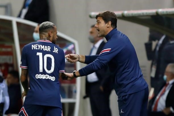 Neymar and Mauricio Pochetitno during the French championship Ligue 1 football match between Stade de Reims and Paris Saint-Germain on August 29,...