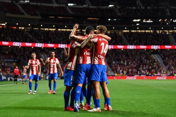 Angel Correa, Luis Suarez and Marcos Llorente celebrates a goal during La Liga match between Atletico de Madrid and Villarreal CF at Wanda...