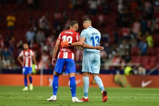 Matheus Cunha and Rulli after La Liga match between Atletico de Madrid and Villarreal CF at Wanda Metropolitano on August 29, 2021 in Madrid, Spain.
