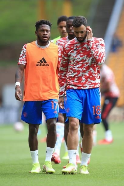 Fred of Manchester United and Bruno Fernandes of Manchester United warm up before the Premier League match between Wolverhampton Wanderers and...