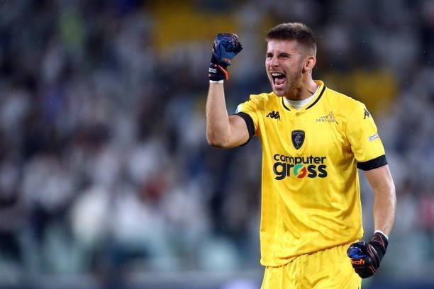Guglielmo Vicario of Empoli FC celebrate after winning during the Serie A match between Juventus and Empoli FC at Allianz Stadium on August 28, 2021...