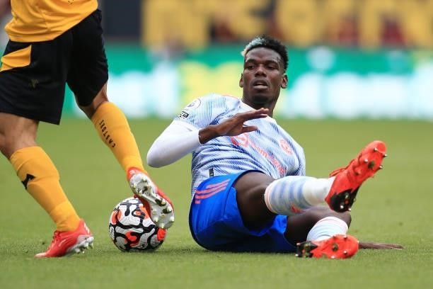 Paul Pogba of Manchester United goes to ground during the Premier League match between Wolverhampton Wanderers and Manchester United at Molineux on...