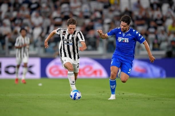 Juventus player Federico Chiesa and Empoli player Riccardo Marchizza during the Serie A match between Juventus and Empoli FC at Allianz Stadium on...
