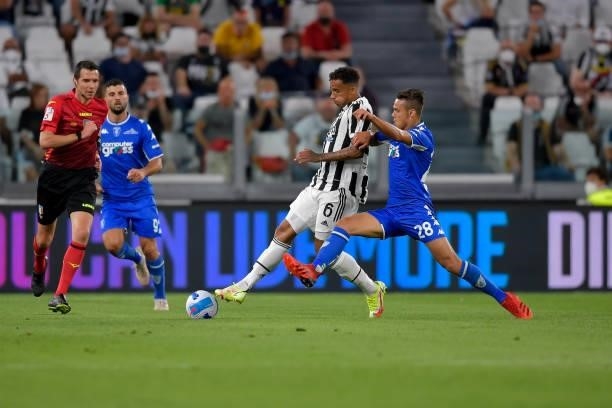 Juventus player Danilo and Empoli player Samuele Ricci during the Serie A match between Juventus and Empoli FC at Allianz Stadium on August 28, 2021...