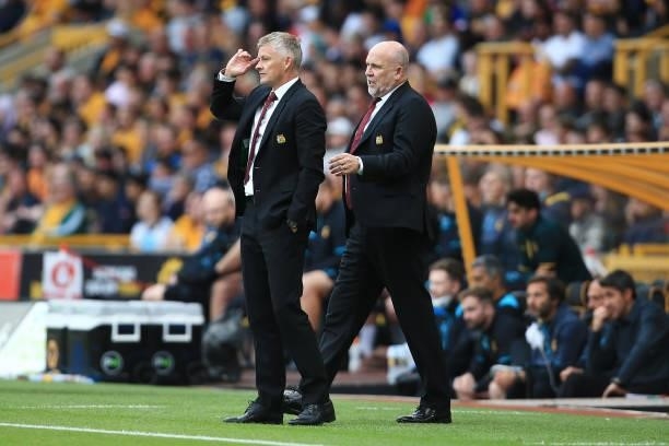 Manchester United manager Ole Gunnar Solskjaer and assistant Mike Phelan look on from the touchline during the Premier League match between...