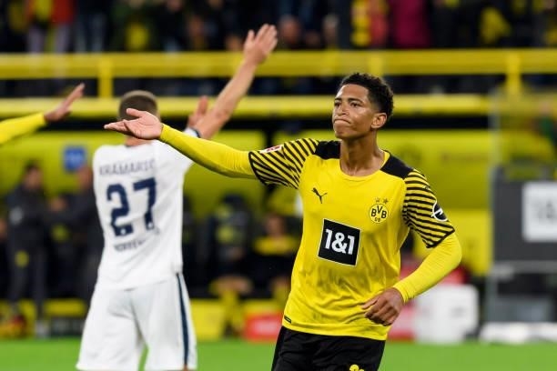 Jude Bellingham of Borussia Dortmund celebrates after scoring his team's second goal during the Bundesliga match between Borussia Dortmund and TSG...