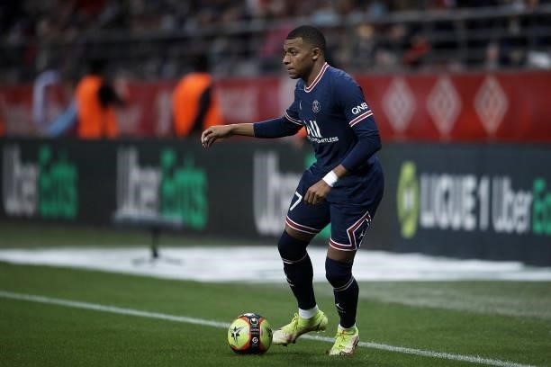 Kylian Mbappe of PSG in action during the Ligue 1 Uber Eats match between Reims and Paris Saint Germain at Stade Auguste Delaune on August 29, 2021...