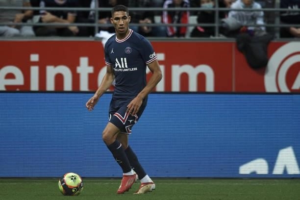 Achraf Hakimi of PSG in action during the Ligue 1 Uber Eats match between Reims and Paris Saint Germain at Stade Auguste Delaune on August 29, 2021...