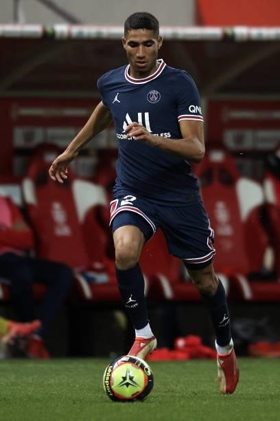 Achraf Hakimi of PSG runs with the ball during the Ligue 1 Uber Eats match between Reims and Paris Saint Germain at Stade Auguste Delaune on August...