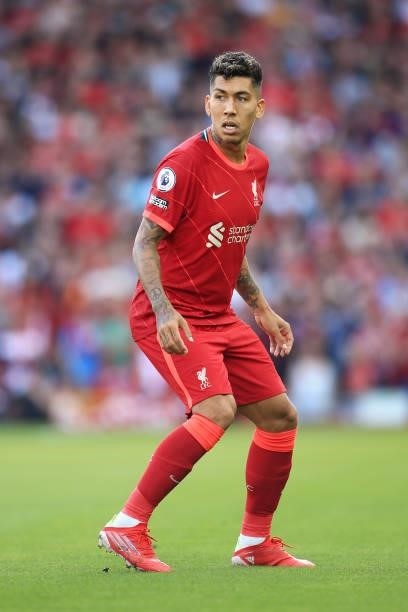 Roberto Firmino of Liverpool looks on during the Premier League match between Liverpool and Chelsea at Anfield on August 28, 2021 in Liverpool,...