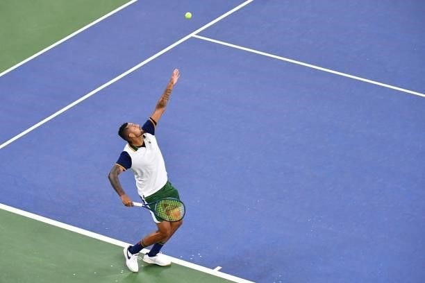 Australia's Nick Kyrgios serves to Spain's Roberto Bautista Agut during their 2021 US Open Tennis tournament men's singles first round match at the...