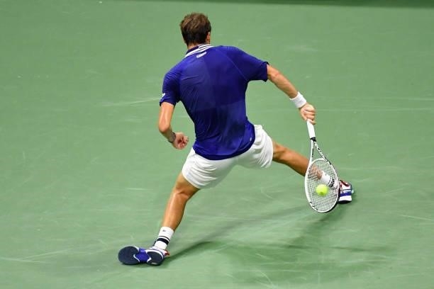 Russia's Daniil Medvedev hits a return to France's Richard Gasquet during their 2021 US Open Tennis tournament men's singles first round match at the...