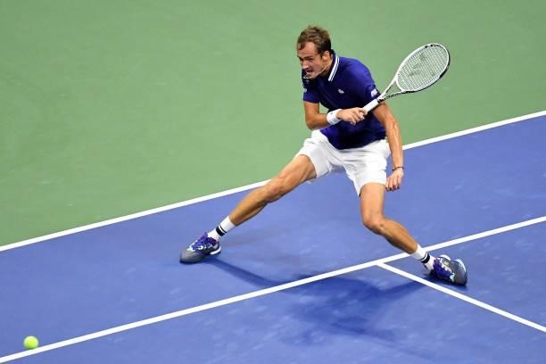 Russia's Daniil Medvedev hits a return to France's Richard Gasquet during their 2021 US Open Tennis tournament men's singles first round match at the...