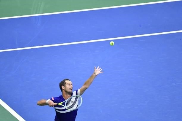France's Richard Gasquet serves to Russia's Daniil Medvedev during their 2021 US Open Tennis tournament men's singles first round match at the USTA...