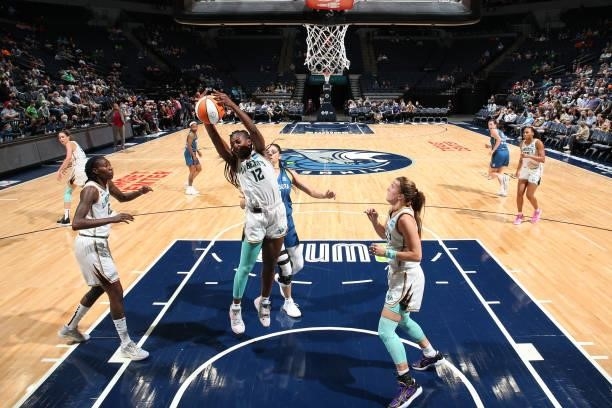 Michaela Onyenwere of the New York Liberty rebounds the ball during the game against the Minnesota Lynx on August 31, 2021 at Target Center in...