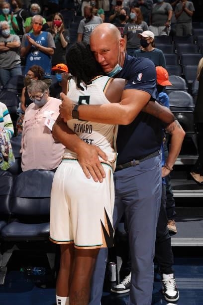 Natasha Howard of the New York Liberty hugs former Minnesota Lynx Assistant Coach Jim Peterson after the game on August 31, 2021 at Target Center in...