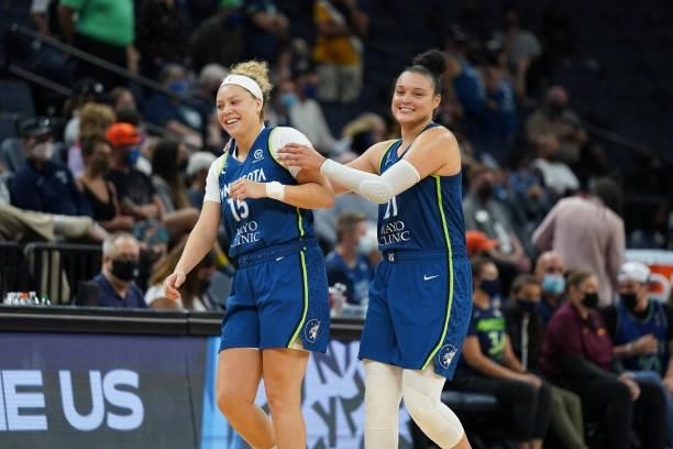 Rachel Banham and Kayla McBride of the Minnesota Lynx celebrate during the game against the New York Liberty on August 31, 2021 at Target Center in...