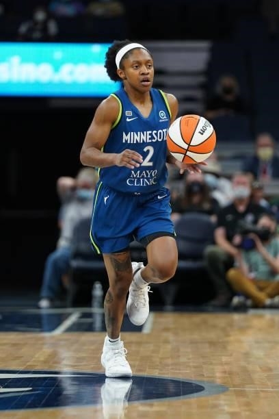 Crystal Dangerfield of the Minnesota Lynx dribbles the ball during the game against the New York Liberty on August 31, 2021 at Target Center in...
